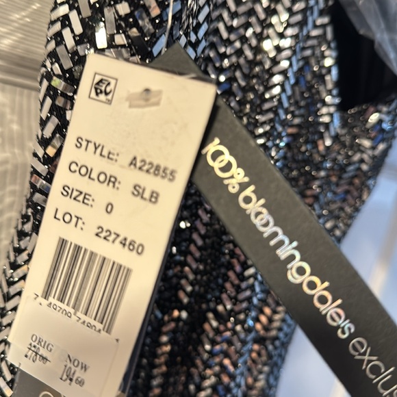 Silver Sequin Gown never worn size 0 purchased at Bloomingdale’s. - Picture 10 of 11